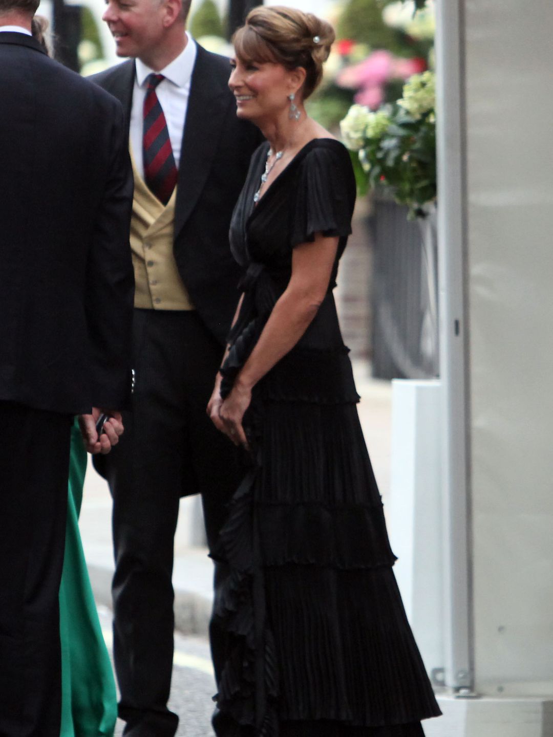 Carole Middleton in a black tiered gown with her hair up
