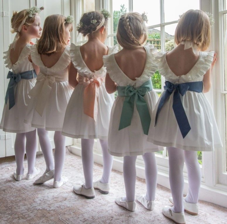 Flower girl dresses with bows by Smock London